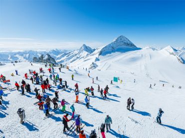 Skiers on top of the mountain