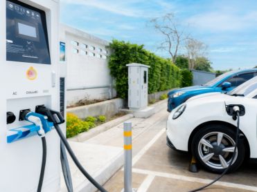 Electric car at charging point