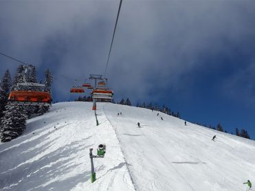 Chair lift over slopes