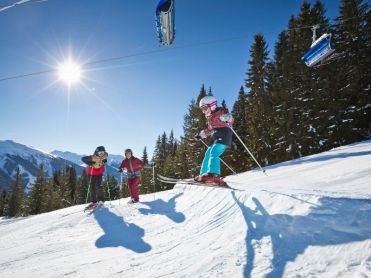 Skiing kids Saalbach