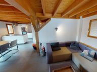 Chalet Le Clos du Pré with a family room-4